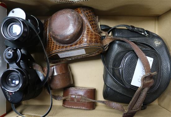 A Perlux camera and case, one other and a pair of binoculars